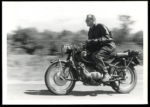 C Wright Mills on his motorbike - or motorcycle as he would have said